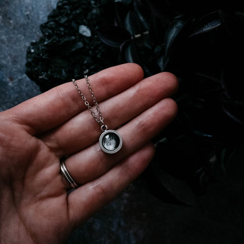 Custom moon phase round circle pendant in silver with thick bezel walls
