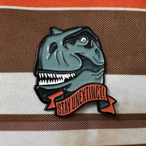 Stay Unextinct Enameled Pin from Dinosaur Extinction