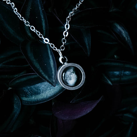 Custom moon phase round circle pendant in silver with thick bezel walls